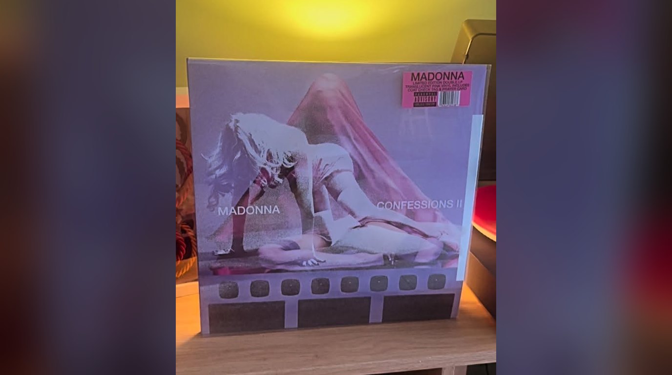 Madonna's Confessions II pink double LP on Zane's shelf, from @zanesgreenroomvinyls